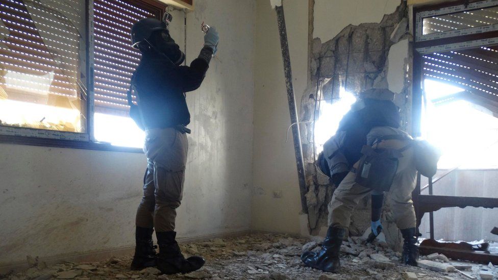 UN chemical weapons experts investigate the site of an alleged chemical weapons attack in Damascus, 2013