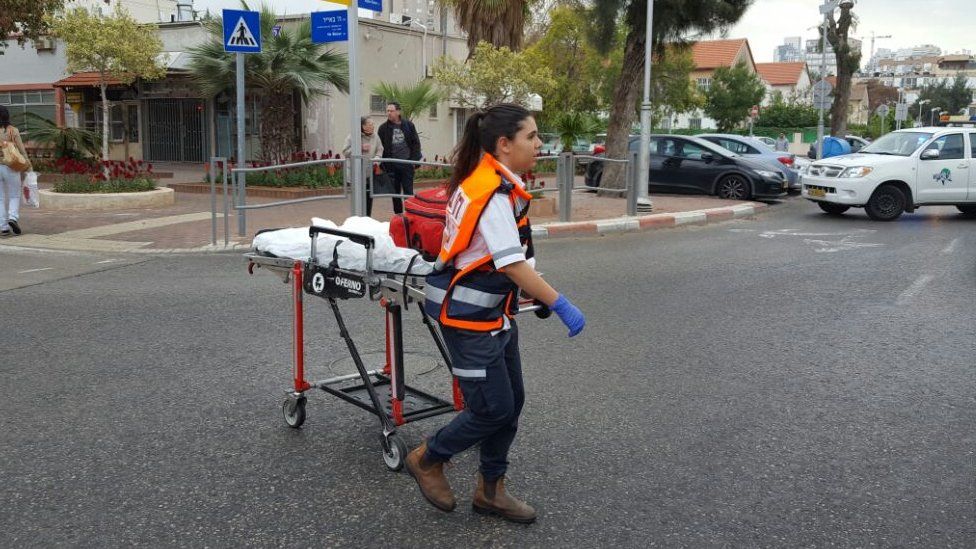 medical worker rushing with stretcher