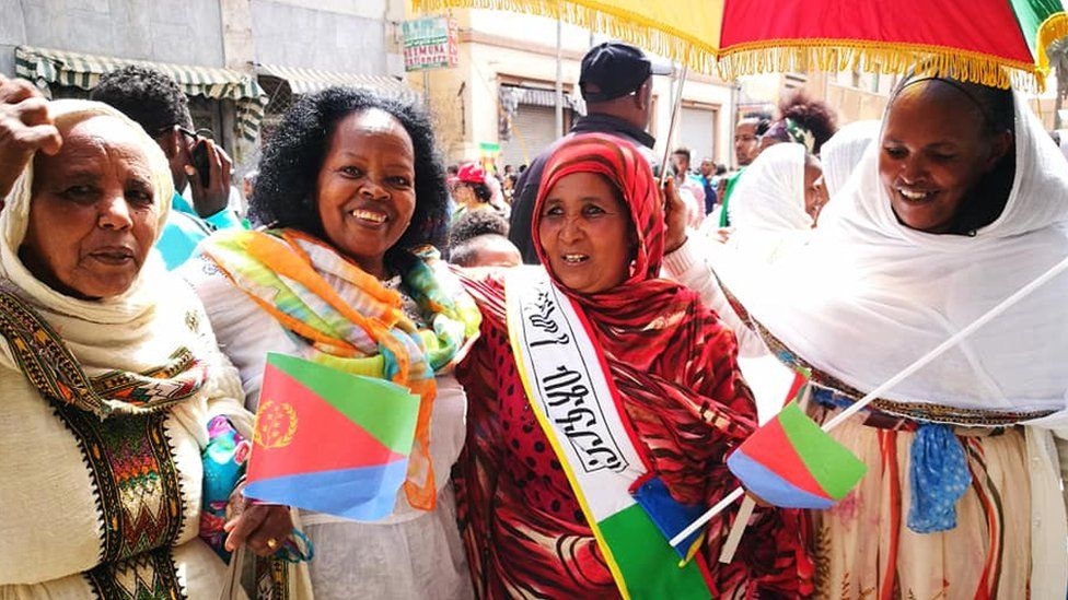 Women with flags in Asmara