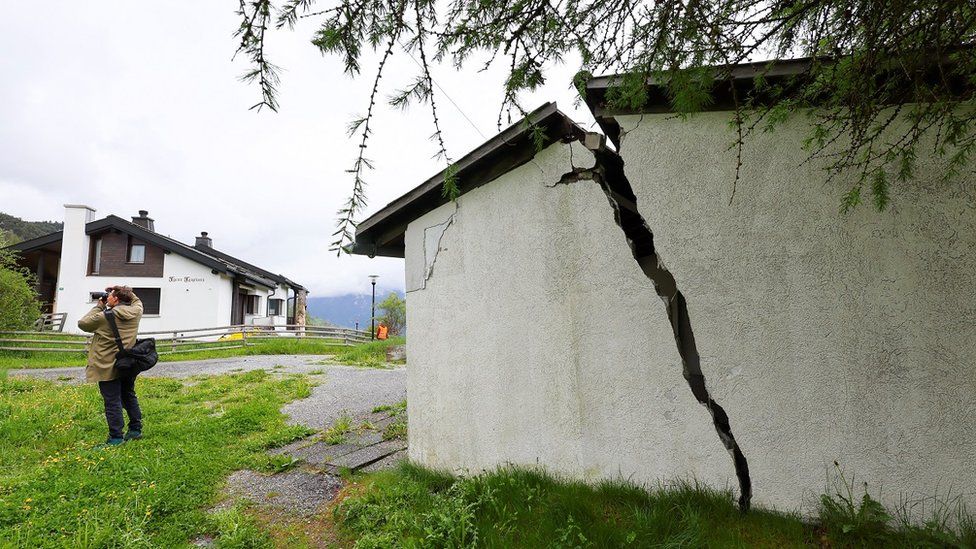 A view shows a crack on a building, in the village of Brienz