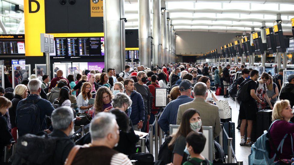 Passengers in Heathrow terminal in June 2022