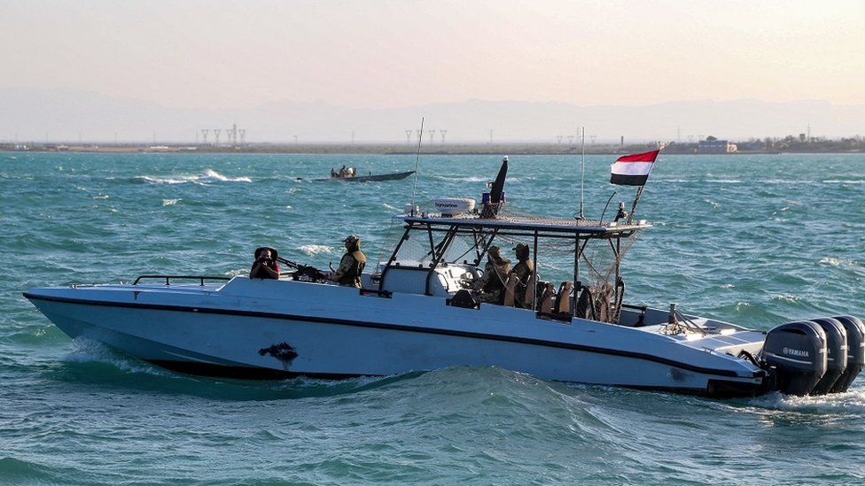 Yemeni coastguard members loyal to the internationally-recognised government ride in a patrol boat in the Red Sea off of the government-held town of Mokha in the western Taiz province, close to the strategic Bab al-Mandab Strait, on December 12, 2023.