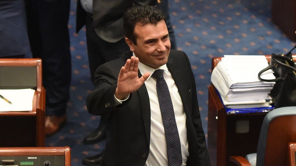 Macedonian Prime Minister Zoran Zaev Waves to journalists after Macedonian lawmakers voted to change the country's name