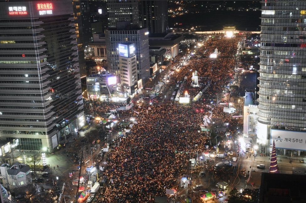 Masses of protesters occupy major streets in the city centre for a rally against South Korean President Park Geun-Hye in Seoul, South Korea, on 10 December 2016.