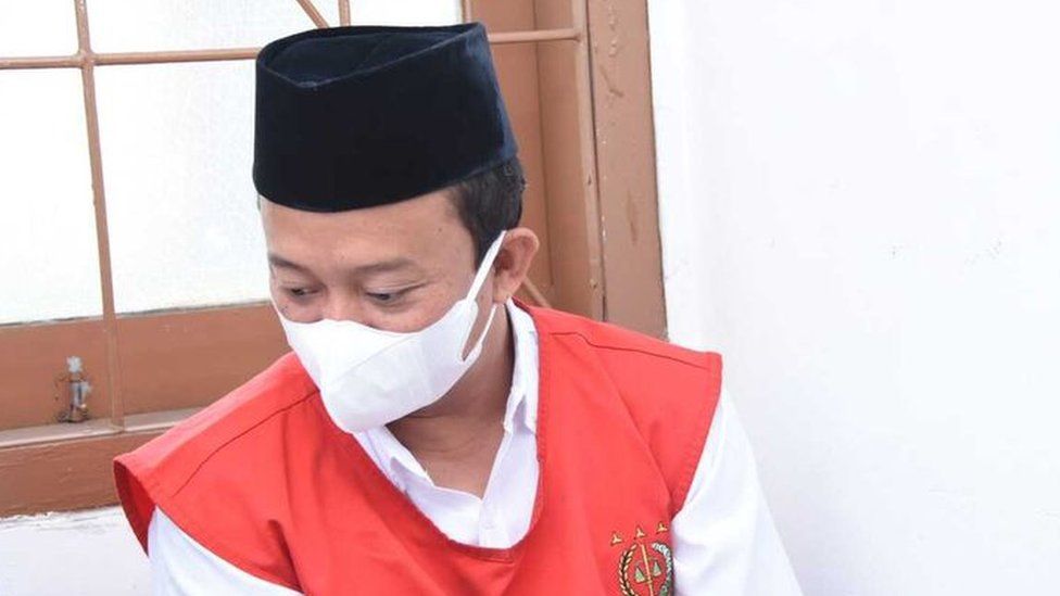 Herry Wirawan: Indonesian teacher who raped 13 female students jailed for  life - BBC News