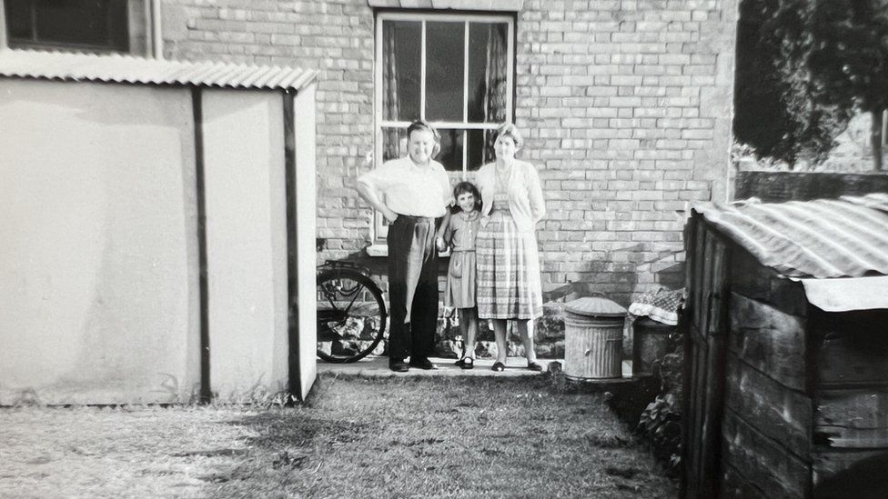 Bert and Nancy Gifford and their daughter Mary in the garden of their The Mead home in the 1950s