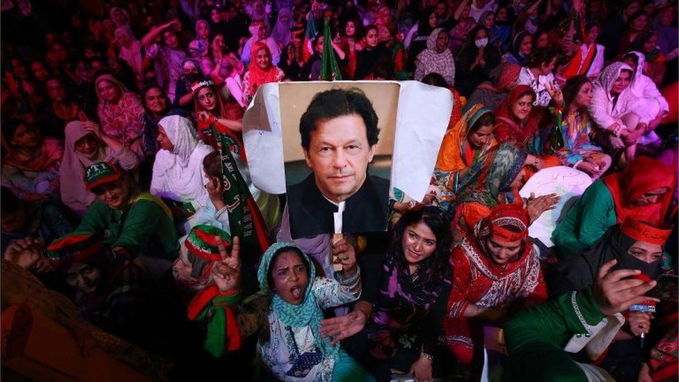 Supporters of opposition party Pakistan Tehrik-e-Insaf listen to former Prime Minister and party"s head Imran Khan, during a protest in Karachi, Pakistan, 19 June 2022.