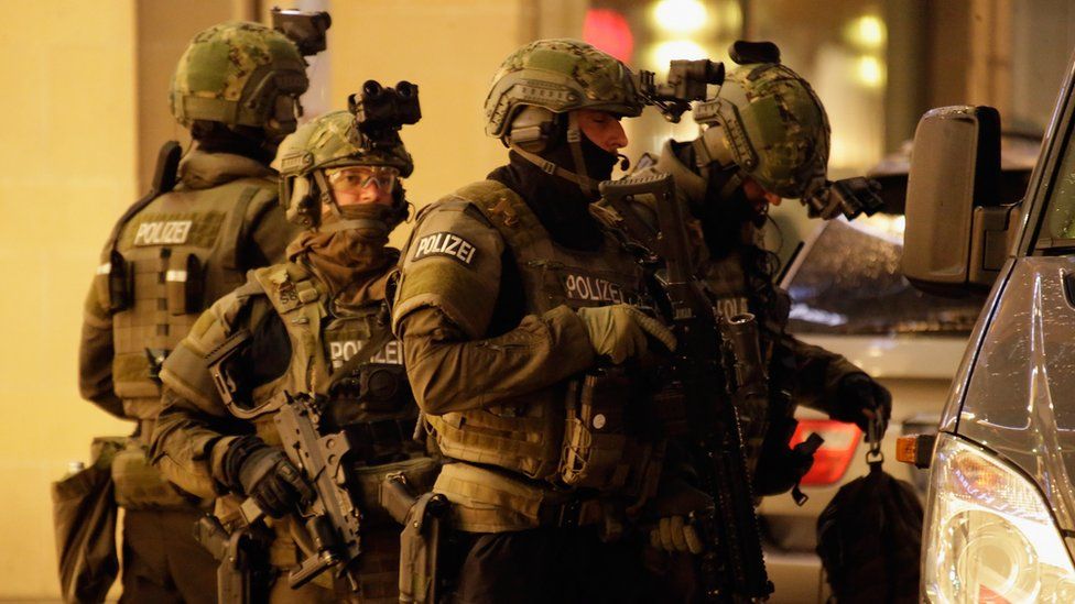 Police officers, armed with machine guns, in Munich following the shootings there