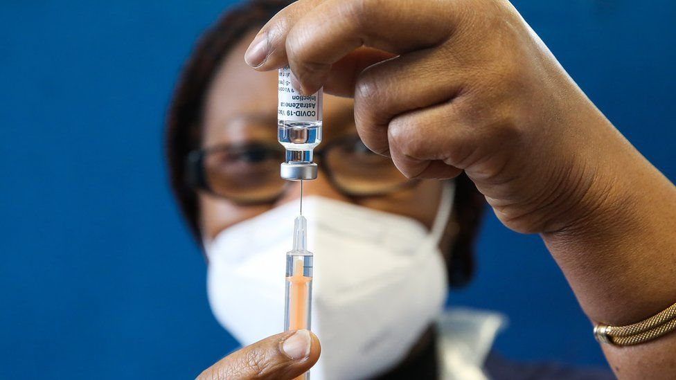 An NHS staff member prepares to administer the Oxford AstraZeneca Covid-19 vaccine in London