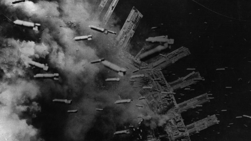 3000 tons of incendiary bombs drop on Japanese positions in the dock area of Kobe