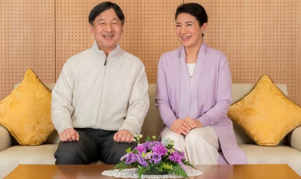Japan's Crown Prince Naruhito and Crown Princess Masako smile at their residence, Togu Palace, in Tokyo