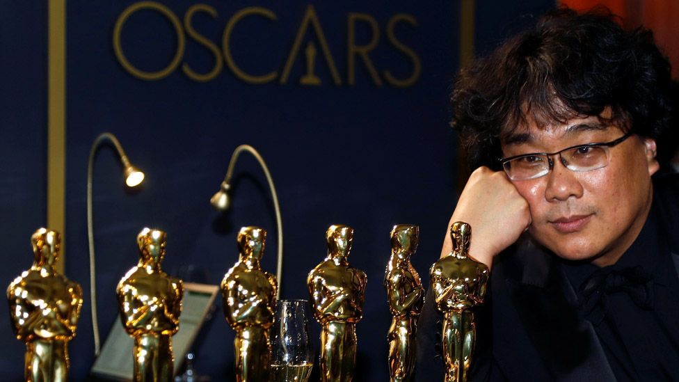 Bong Joon-ho with his Oscars