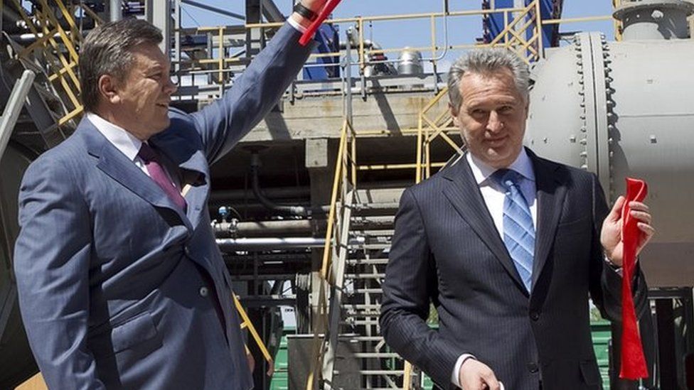 Dmytro Firtash (R) with then President Viktor Yanukovych at an opening ceremony in Crimea (April 2012)