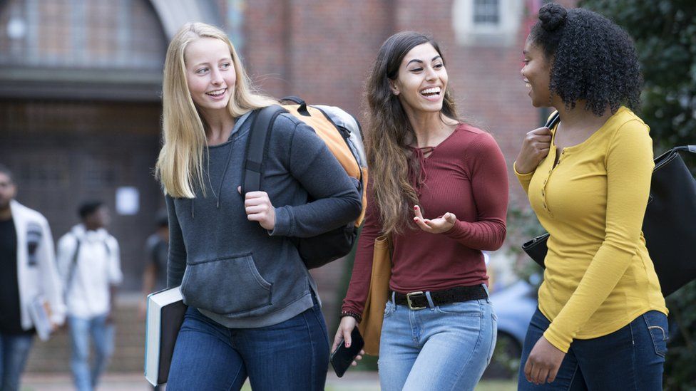 College students walking across a courtyard