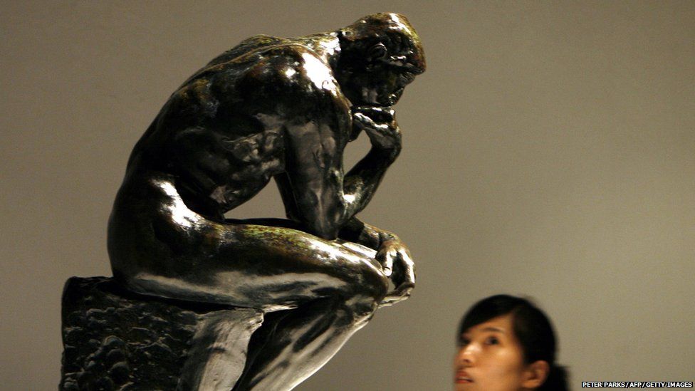 The Thinker sculpture by French artist Rodin.