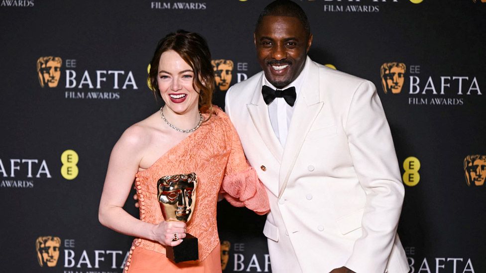 Emma Stone and Idris Elba