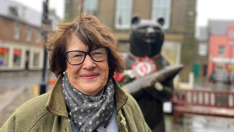 Historian Aileen Orr at the Wojtek the Bear statue in Duns
