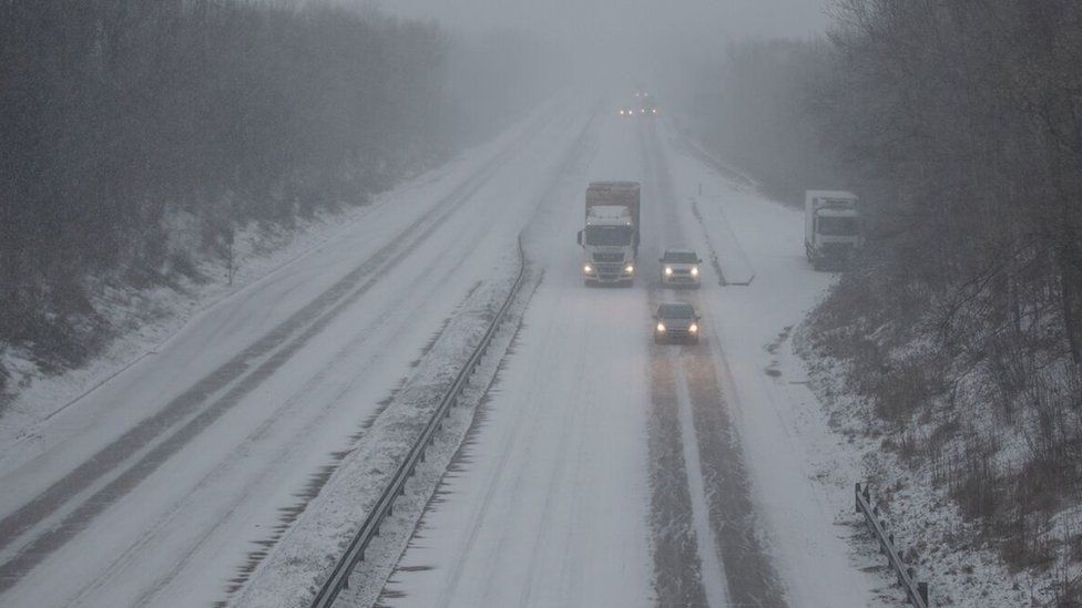 Heavy snow making driving difficult on the A4232 in Cardiff during the 'Beast from the East' storm in March 2018