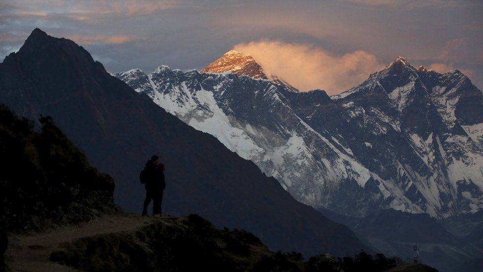 Mount Everest in the distance, at sunset