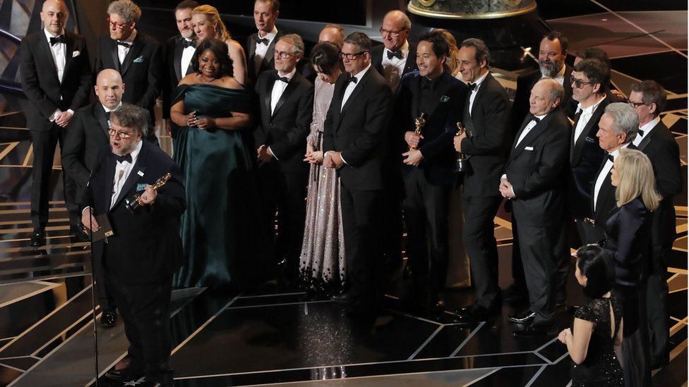 The Shape of Water cast and crew accepting the award for best picture