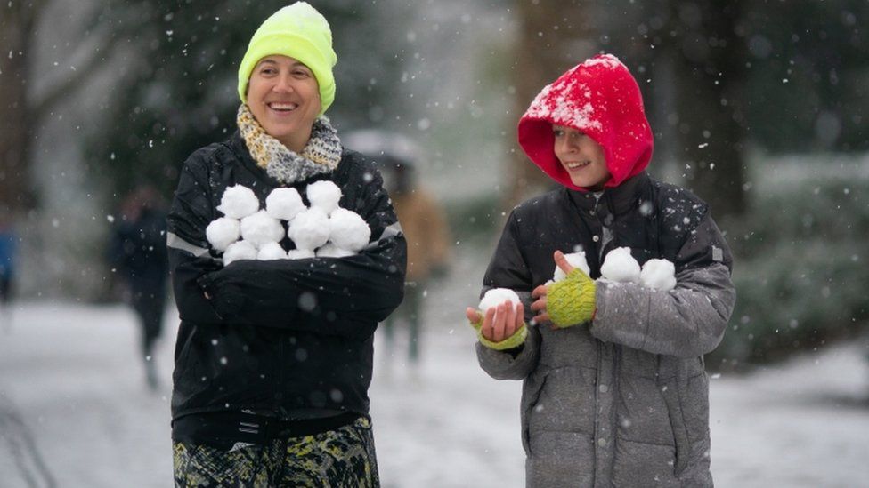 Snowball fight in Battersea Park, south-west London