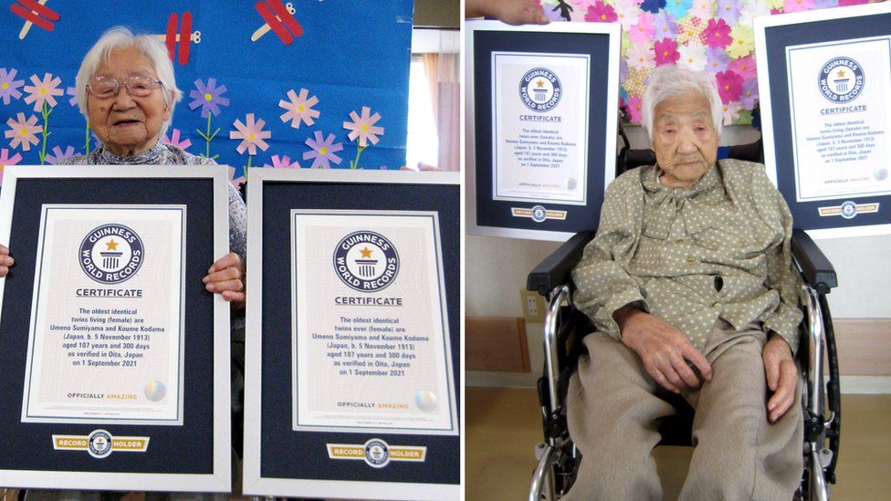 Umeno Sumiyama (L) and Koume Kodama with their official certificates