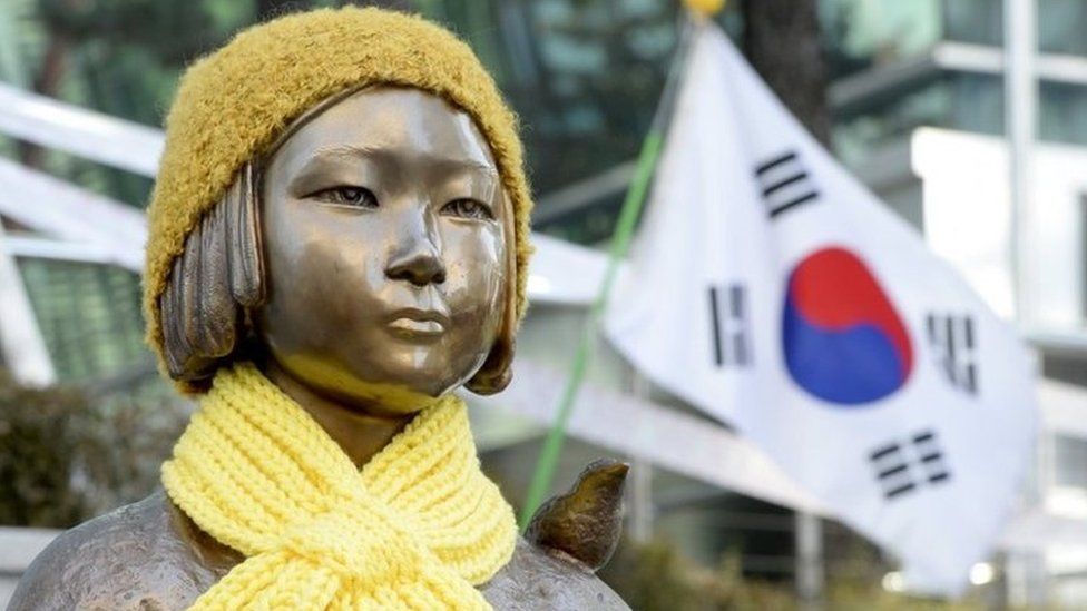 A statue of a girl that represents the sexual victims by the Japanese military is seen in front of Japanese embassy in Seoul, South Korea, December 28, 2015