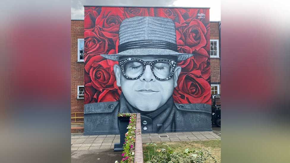 Mural of Sir Elton John on the side of Watford library