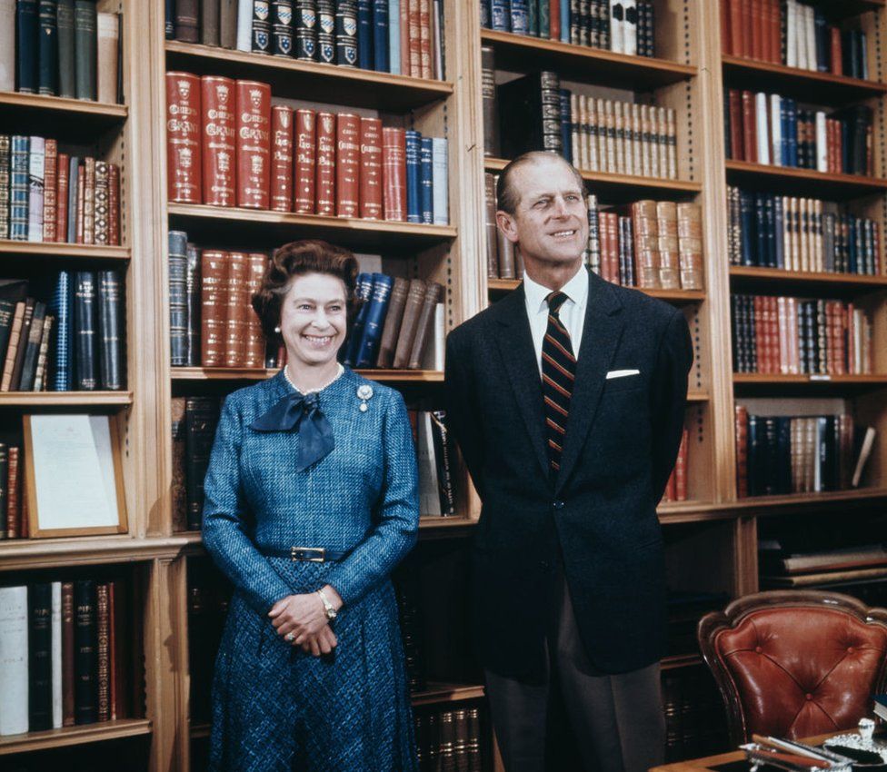 The Queen and Prince Philip in study