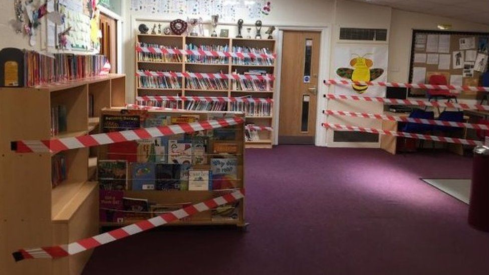 Taped off library books, St Margaret's C of E Primary School, Bury