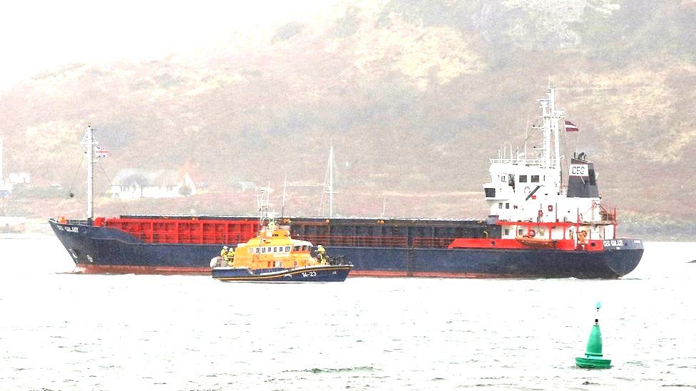 Lifeboat and freighter