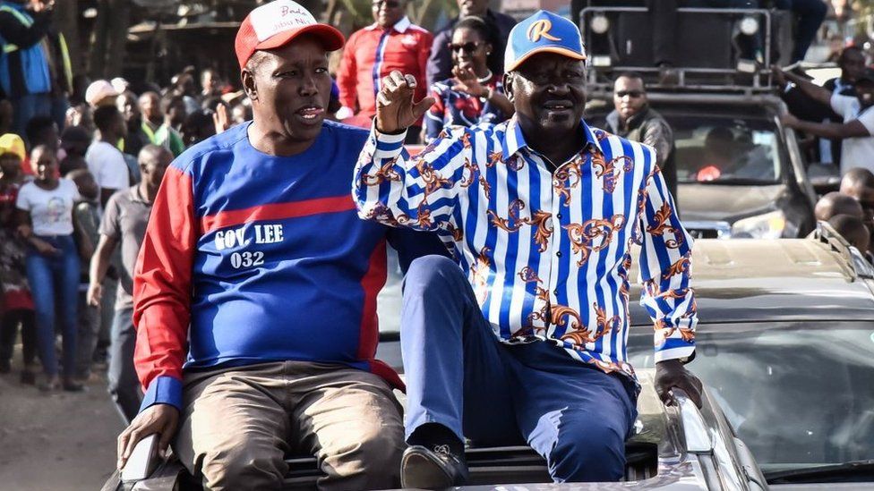 Azimio coalition party's Raila Odinga (R) reacts to supporters with Nakuru county Governor Lee Kinyanjui (L) during his rally after being officially nominated as a Presidential candidate by Independent Electoral and Boundaries Commission (IEBC) in Nakuru on June 5, 2022