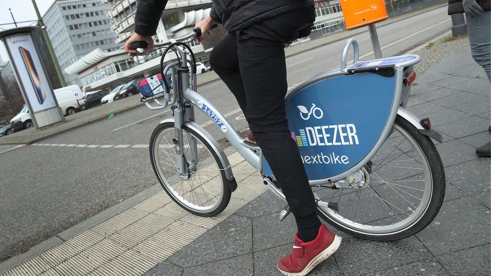 A man on a nextbike rented bicycle in Berlin