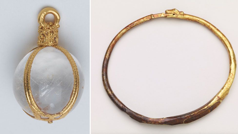 Close-up views of the crystal pendant and the arm-ring