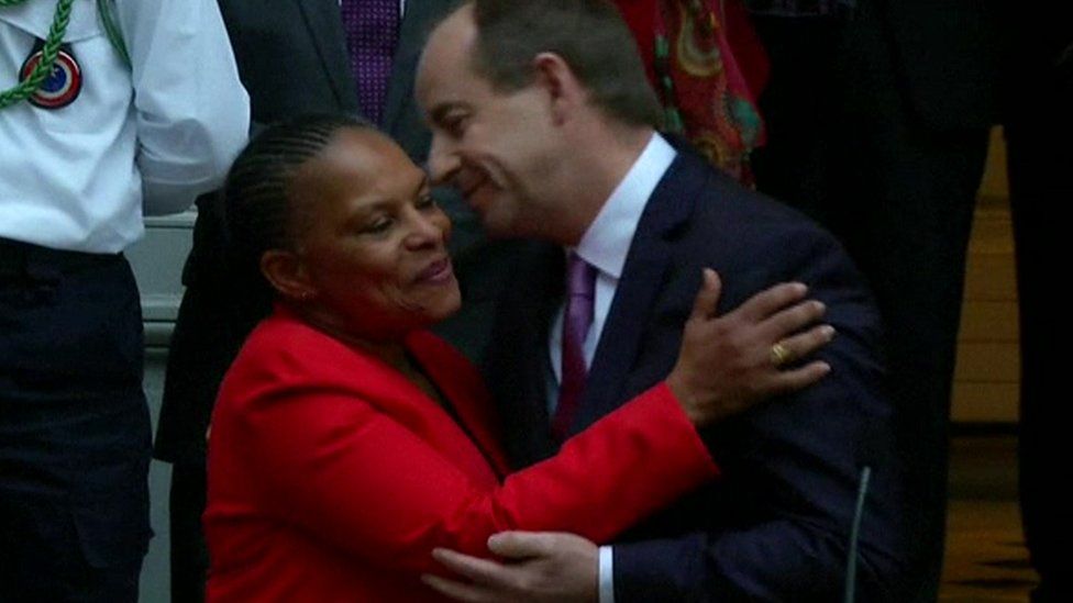 Ms Taubira embracing her successor