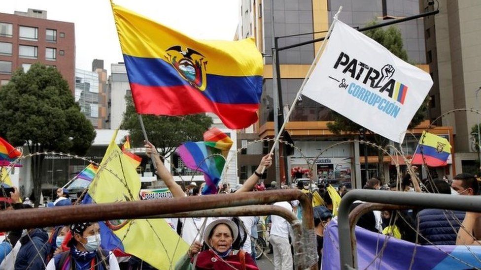 Supporters of Ecuador's presidential candidates Yaku Perez and Guillermo Lasso gather outside the Electoral National Council (CNE) in Quito, Ecuador, February 12, 2021