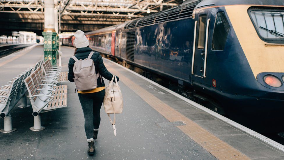 Woman at train station