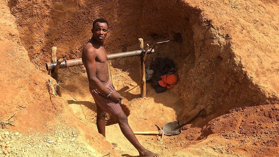 A man takes a break from work at the Barkin Ladi mine