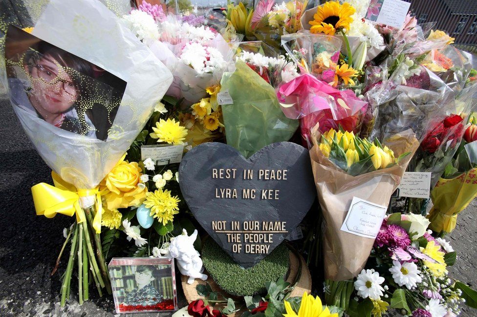 Floral tributes laid at the scene where Lyra McKee was shot in Londonderry
