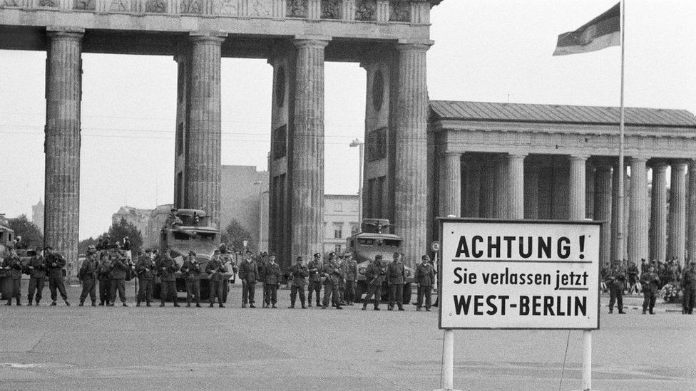 Start of the construction of the Berlin Wall, August 1961. East German border guards at the Brandenburg Gate