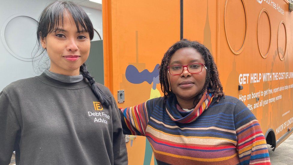 Anne (left) and Retee with the mobile advice centre in London