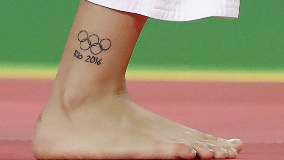 Gold medallist swimmer Kyle Chalmers unveils new Olympic tattoos