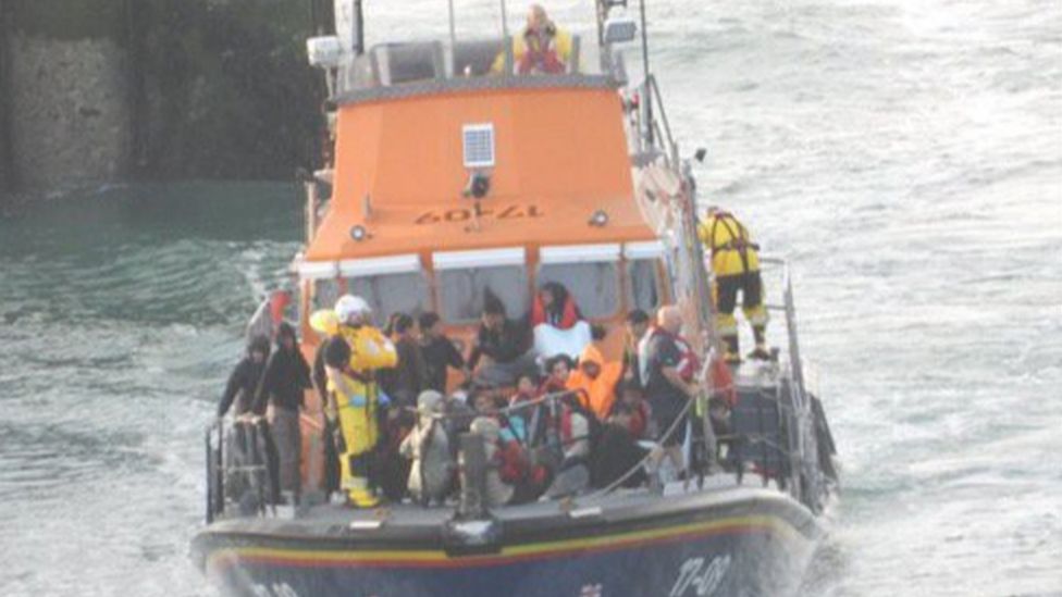 Migrants arrive by lifeboat in Dover