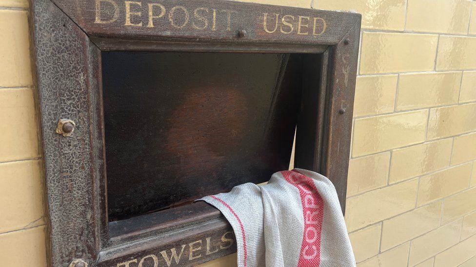 Towel deposit box at