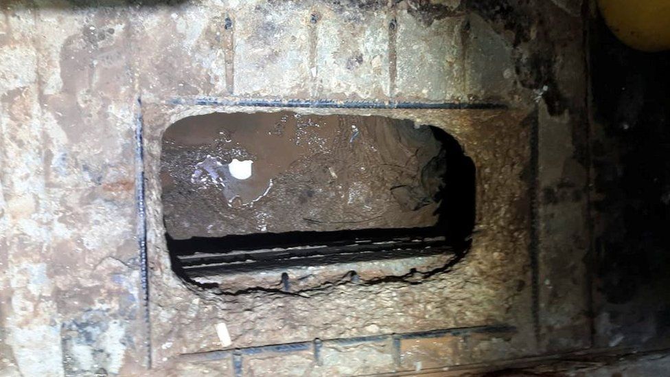 Hole in floor of cell bathroom at Gilboa prison