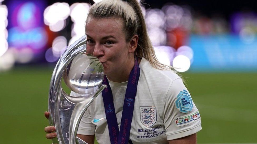 England's Lauren Hemp celebrates with the trophy following victory over Germany in the UEFA Women's Euro 2022 final at Wembley Stadium, London