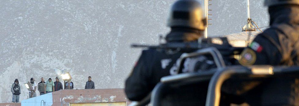 Armed police watch inmates at Topo Chico prison. 11 Feb 2016