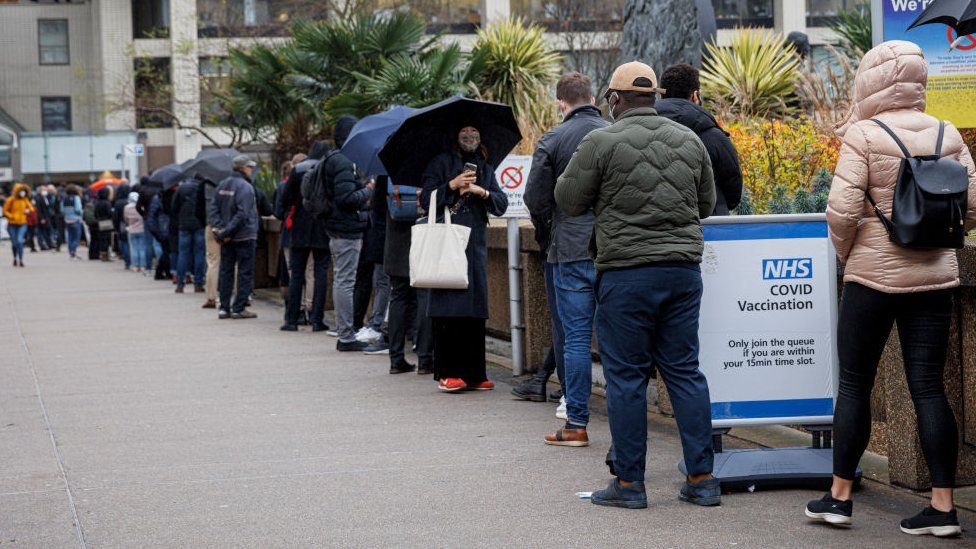 Queue outside the vaccination centre at St Thomas' Hospital in London