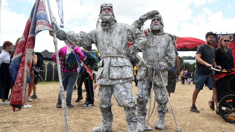 Performers appeared as frozen arctic explorers at the Glastonbury festival