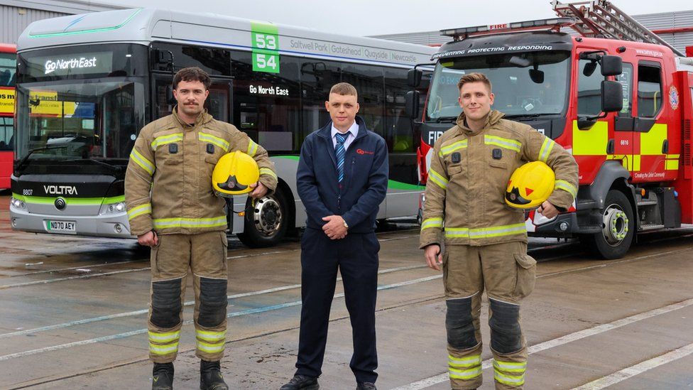 Connor, with firefighters